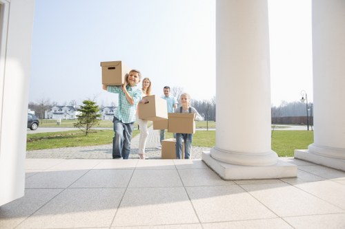Moving staff wearing PPE during a safe furniture removal