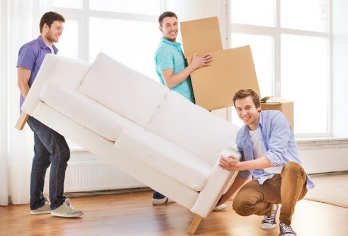 Packed household boxes and furniture prepared for a Kingscross home relocation