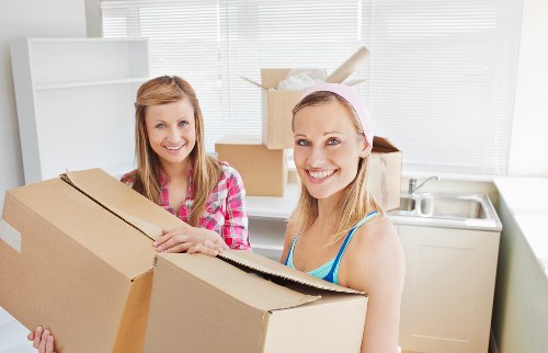 Loading furniture into a removal truck in central London